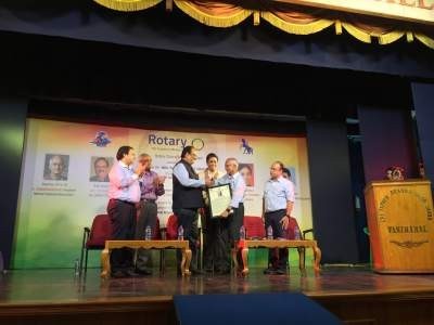 Mr.D.Chandrashekar being presented with the momento