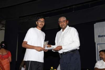 Senior student receiving prize from the Chief Guest Mr. Vidya Shankar