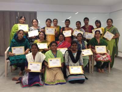 Set of trainees who completed the programme with their certificates